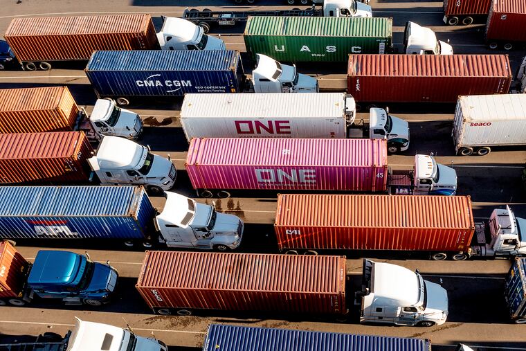 Trucks line up to enter a Port of Oakland shipping terminal in 2021 in Oakland, Calif. The impact of tariffs has been a concern to businesses that use imported materials.