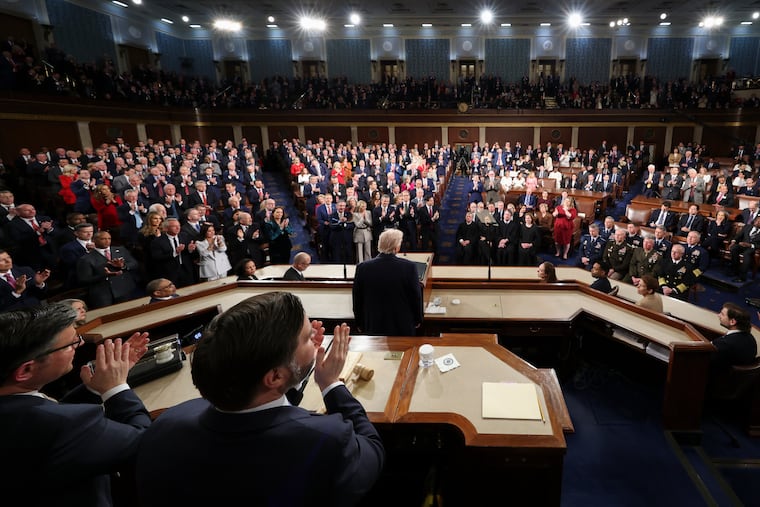 Members of Congress give a standing ovation Tuesday as President Donald Trump delivers the State of the Union address.