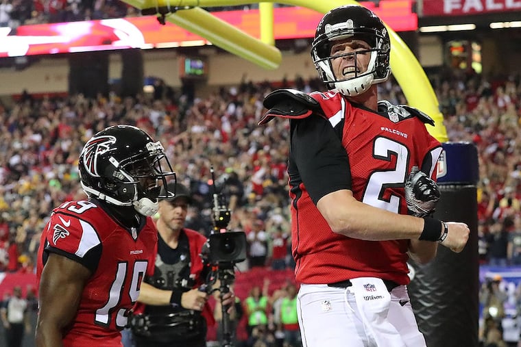 Atlanta Falcons quarterback Matt Ryan reacts to scoring a touchdown on a quarterback keeper against the Green Bay Packers to take a 17-0 lead during the second quarter in the NFC Championship game on Sunday, Jan. 22, 2017, in Atlanta, Ga.