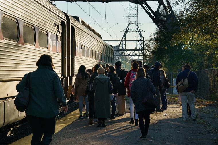 Commuters at the East Falls Regional Rail SEPTA Station. New Regional Rail schedules go into effect Sunday, March 8.