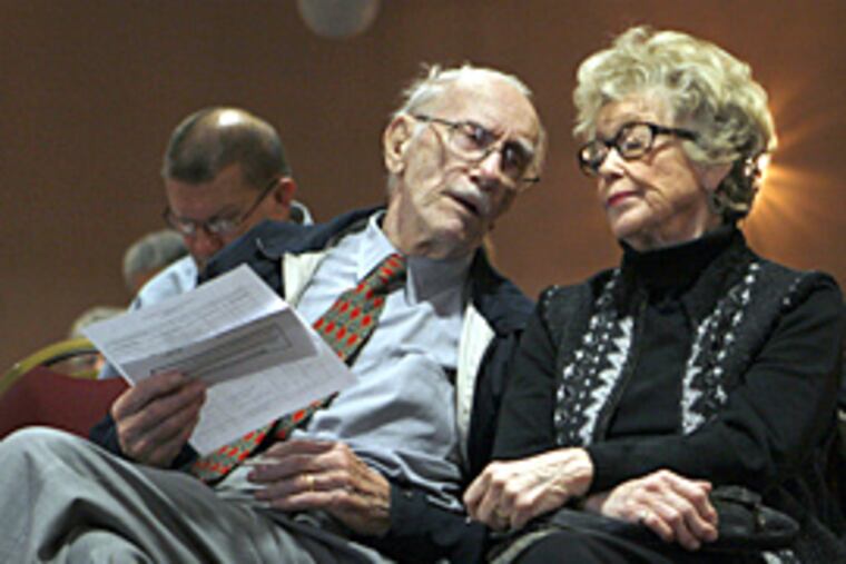 The Pennsylvania Employee Benefit Trust Fund held 15 meetings with local state retirees last week to acquaint them with new health plans. Thomas and Eleanor Daws of Hershey's Mill talk during a meeting at the Inn at Chester Springs on Wednesday. (Bonnie Weller/Inquirer)