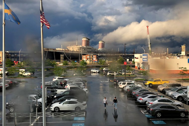 The sun returns over the SS United States after a storm passed through South Philadelphia headed to New Jersey in 2019. The retired ocean liner has been docked at Pier 82 on the Delaware River, across from the Ikea store, since 1996.