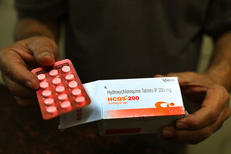 A chemist displays hydroxychloroquine tablets in New Delhi, India.
