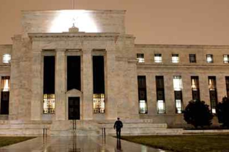 The Federal Reserve Building in Washington would house fewer regulatory powers under Dodd's revisionist bill.
