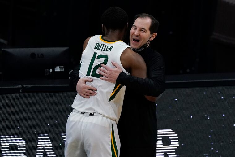 Baylor guard Jared Butler (12) gets a hug from head coach Scott Drew.