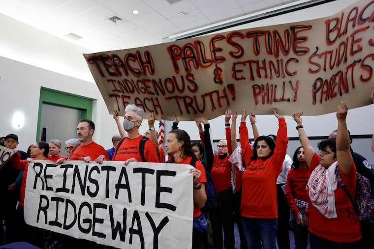Parents, teachers and community members disrupt Thursday's Philadelphia school board meeting, demanding the school district reinstate teacher Keziah Ridgeway, who has been removed from her teaching post at Northeast High.
