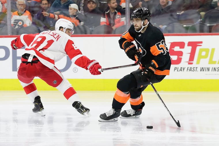 Flyers defenseman Shayne Gostisbehere skating with the puck against Detroit earlier this season. Gostisbehere's name has been bandied about in several trade rumors.