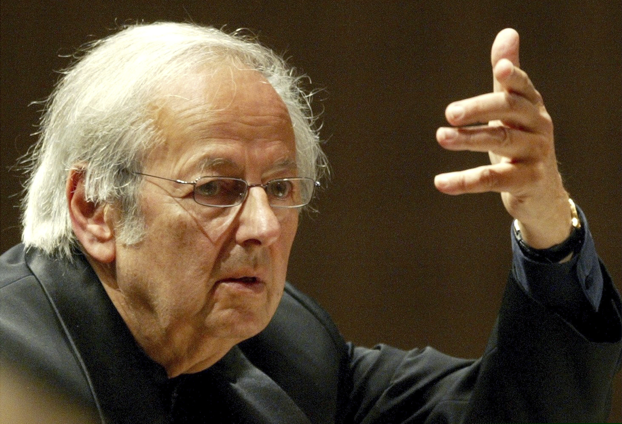 FILE - In this Sept. 1, 2004 file photo, conductor of the Oslo Philharmonic Orchestra, Andre Previn, conducts the 15th symphony concert during the Lucerne Festival in the concert hall in Lucerne, Switzerland. Previn, the pianist, composer and conductor whose broad reach took in the worlds of Hollywood, jazz and classical music, died in his Manhattan home, Thursday, Feb. 28, 2019. He was 89.