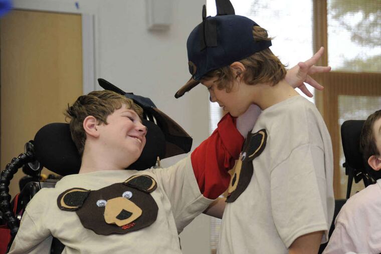 Sean Hanlon (left), a student