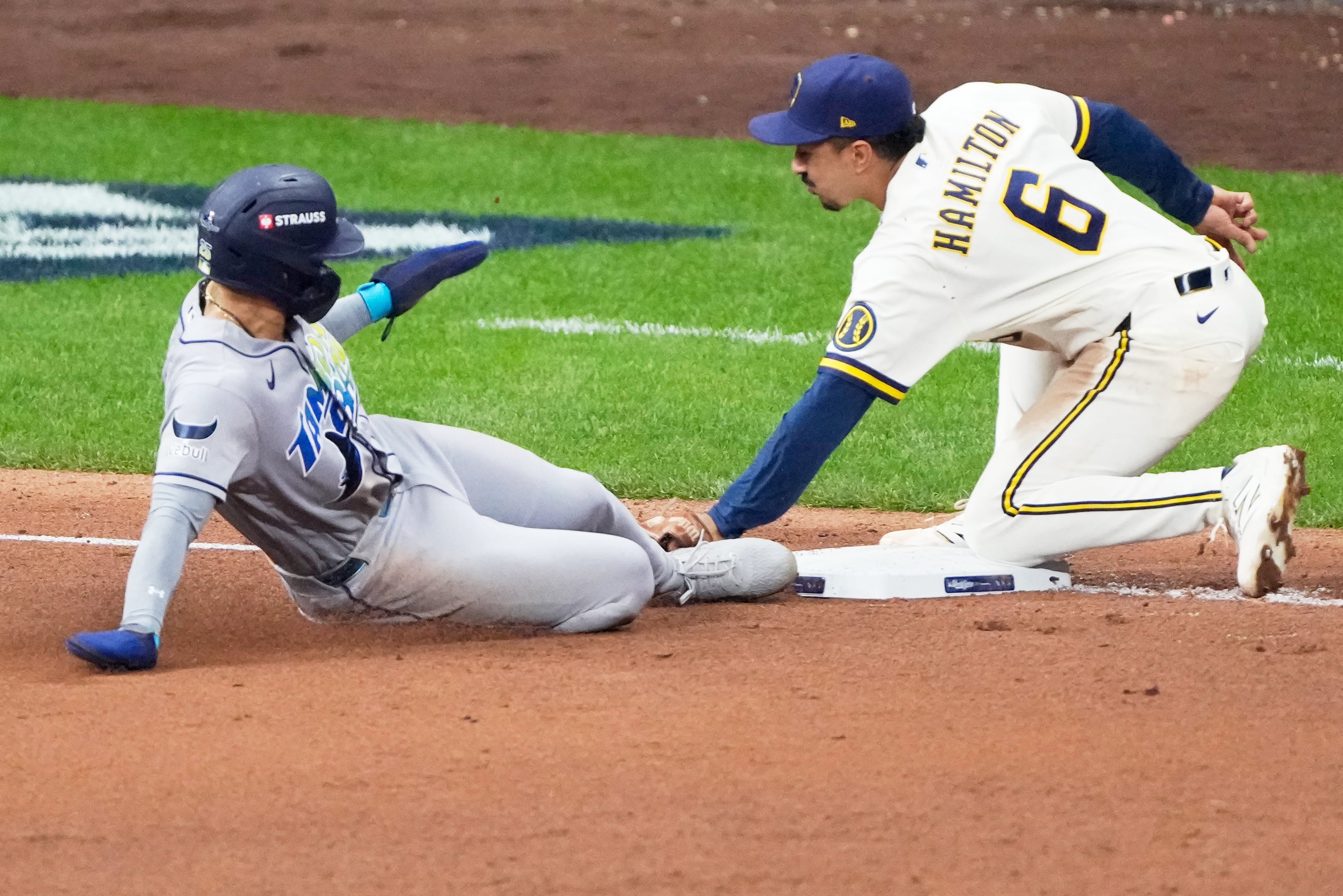 Balls glancing off gloves, runners thrown out trying to steal sink Rays in World Series opener