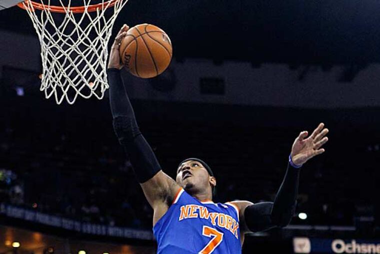 Carmelo Anthony scored 31 points in his return to the lineup, and the host New York Knicks beat the Brooklyn Nets, 100-86. (Gerald Herbert/AP)