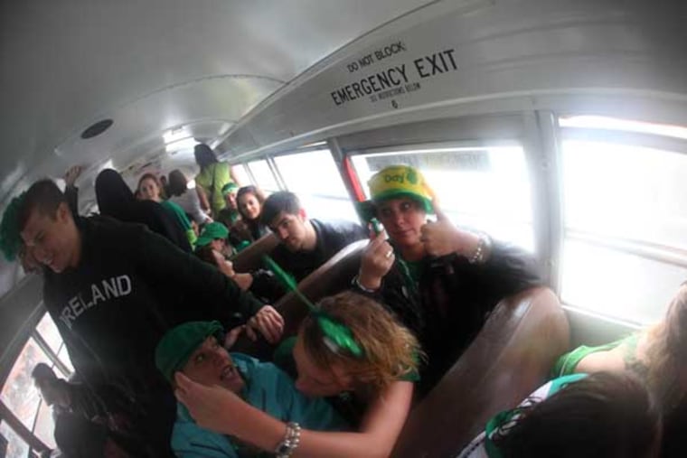 Revelers take part in Saturday's Erin Express 2010, which featured plenty of traditional Irish music and food, plus Guinness, Harp and Jameson.