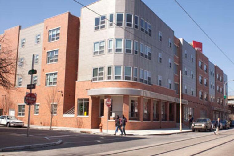 The building features 37 apartment units, a community medical office, and a beauty salon. (Ed Hille / Staff Photographer)