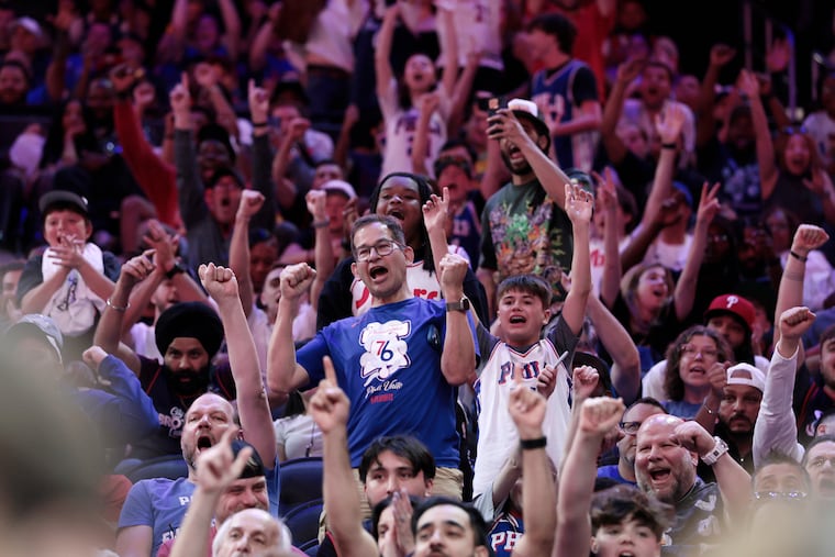 Fans cheer at the start of the fourth quarter during the Magic-76ers NBA Play-In Tournament game at Xfinity Mobile Arena on April 15.