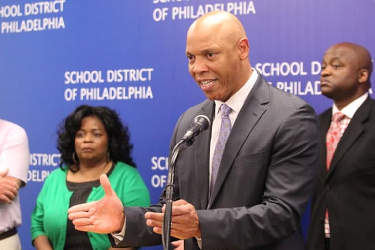 Superintendent William R. Hite Jr., center, announced o n Aug. 8, 2013, that Philadelphia schools may not open as scheduled on Sept. 9 unless the district has assurances by next week that it will receive $50 million from the city. He said the district would delay opening all 220 district schools, open just a few or operate them on half-day schedules because of the continuing financial crisis. He is backed by high school principals. ( CHARLES FOX / Staff Photographer )