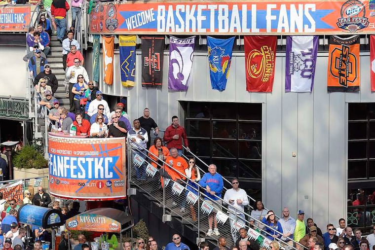 Fans watch basketball at Cordish's Power & Light District in Kansas City, Mo., the site of numerous racial discrimination complaints. Kansas City Star