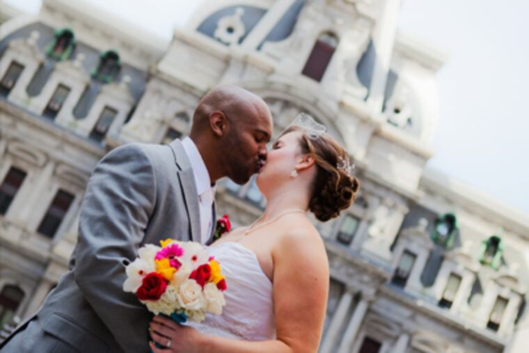 Jennifer Crandall and Rudnell Potter in front of City Hall.