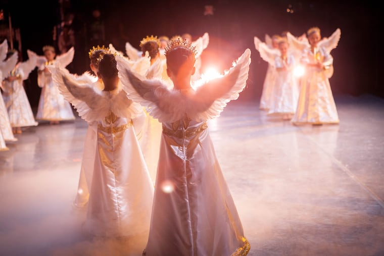 Student dancers from the Rock School for Dance Education in the angels scene of Peter Stark's "Nutcracker."