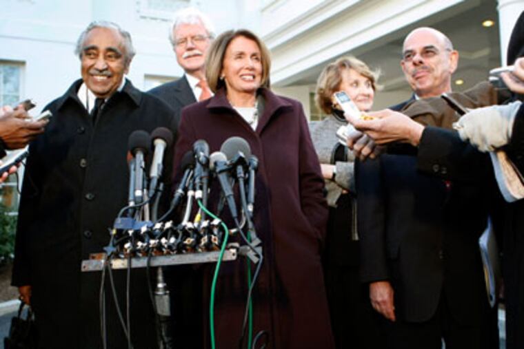 House Speaker Nancy Pelosi speaks with fellow lawmakers outside the West Wing of the White House after meeting with President Obama on Wednesday, Jan. 6, 2010. (AP Photo/Gerald Herbert)