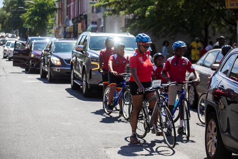 Monica Hankins-Padilla, director of external relations at the Temple University Police Department, and members of the Urban Bike Team participated in Saturday's “Peace Ride” in Philadelphia to raise awareness about gun violence and prevention resources.