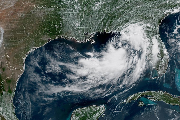 This GOES-19 GeoColor satellite image provided by NOAA shows a tropical depression in the Gulf of Mexico, Monday, July 20, 2026. It became Tropical Storm Bertha Monday evening.