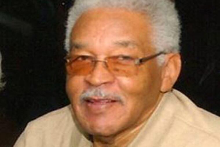 Robert L. “Joe” Holmes