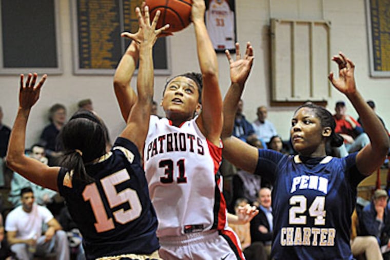 Germantown Academy's Jaryn Garner takes a shot in traffic. (Sharon Gekoski-Kimmel/Staff Photographer)