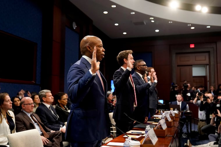 Eric Adams, mayor of New York, from left, Mike Johnston, mayor of Denver, Brandon Johnson, mayor of Chicago, and Michelle Wu, mayor of Boston, are sworn in during a House Oversight and Governmental Affairs Committee hearing in Washington, D.C.