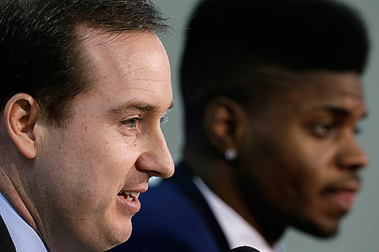Philadelphia 76ers GM Sam Hinkie and rookie Nerlens Noel. (AP Photo/Matt Rourke)