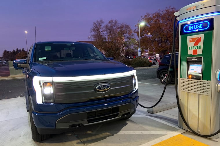 An all-electric Ford F-150 Lightning. Ford said it will put a hold on production of its flagship EV and will instead produce a gas-powered pickup truck at a Tennessee plant.