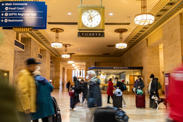 People waiting and heading to their rides for the holiday weekend at the 30th Street Station in Philadelphia, Pa., on Thursday Dec. 22, 2022.