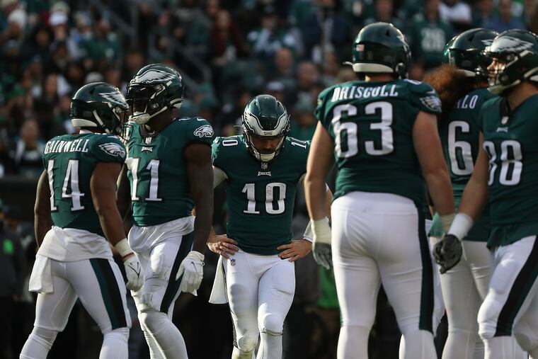 Eagles quarterback Gardner Minshew returns to the huddle after getting sacked in the second quarter against the New Orleans Saints.