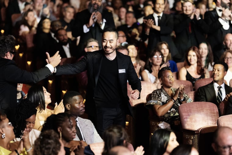 Chef Jesse Ito rises from his seat to accept the James Beard Award for Best Chef, Mid-Atlantic, at the Lyric Opera in Chicago on June 15, 2026.