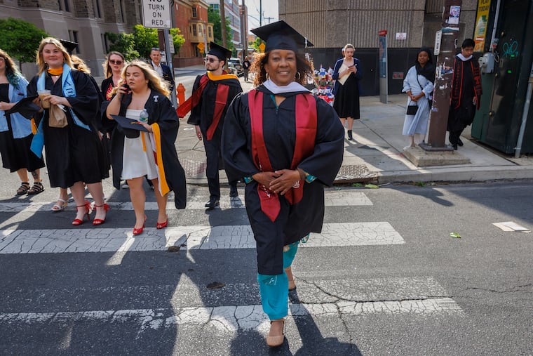 Peggy E. Moore arrives for commencement at Temple University on Wednesday. 