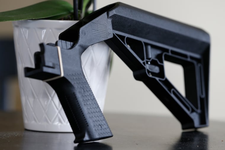 A bump stock is displayed in Harrisonburg, Va., in 2019.