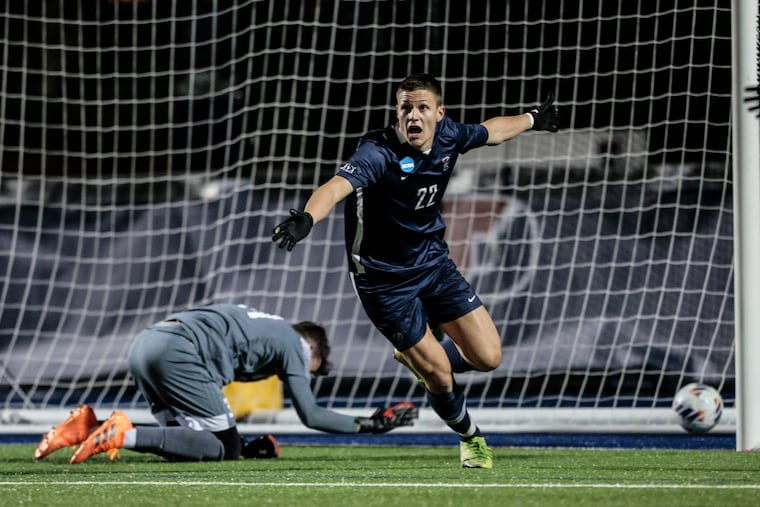 Penn's Stas Korzeniowski celebrates his goal on Rutgers goalkeeper Ciaran Dalton during the first half of NCAA Tournament first round play at Penn Park on Thursday.