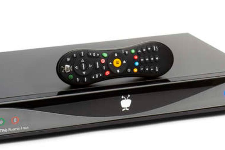 The new Roamio Plus (left) with the TiVo mini, which extends the functionality of the main TiVo into another room.