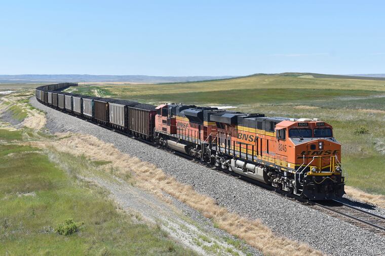 A BNSF railroad train hauling carloads of coal from the Powder River Basin of Montana and Wyoming is seen east of Hardin, Mont., on July 15, 2020.