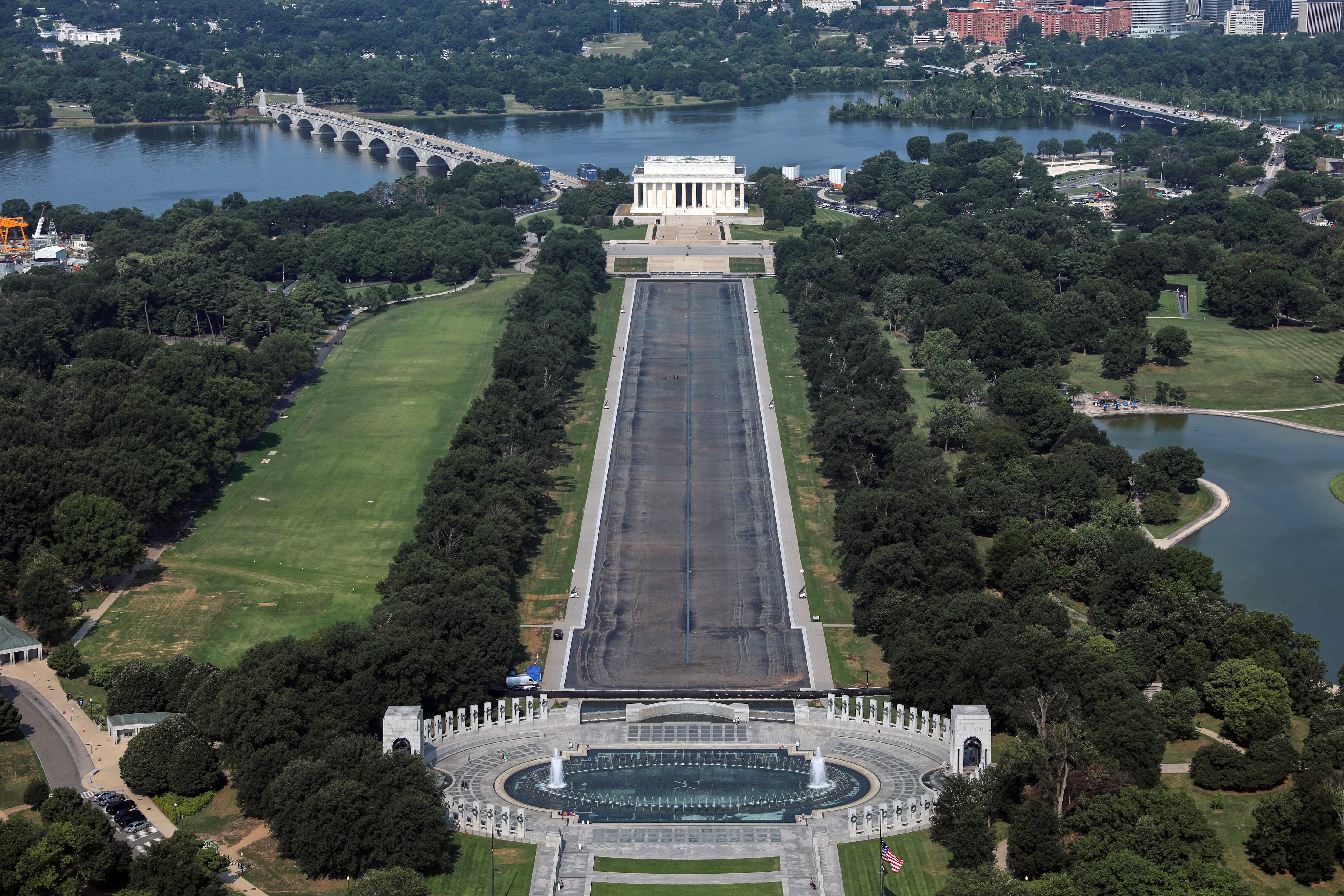 Drained Reflecting Pool reveals Trump's 'American flag blue' liner is now closer to gray