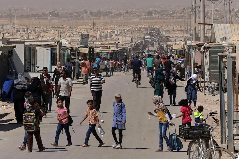 The Za'atari refugee camp for Syrians in Jordan. Many blame the violence and destruction they have endured both on Syrian President Bashar al-Assad and Islamic State and oppose both.