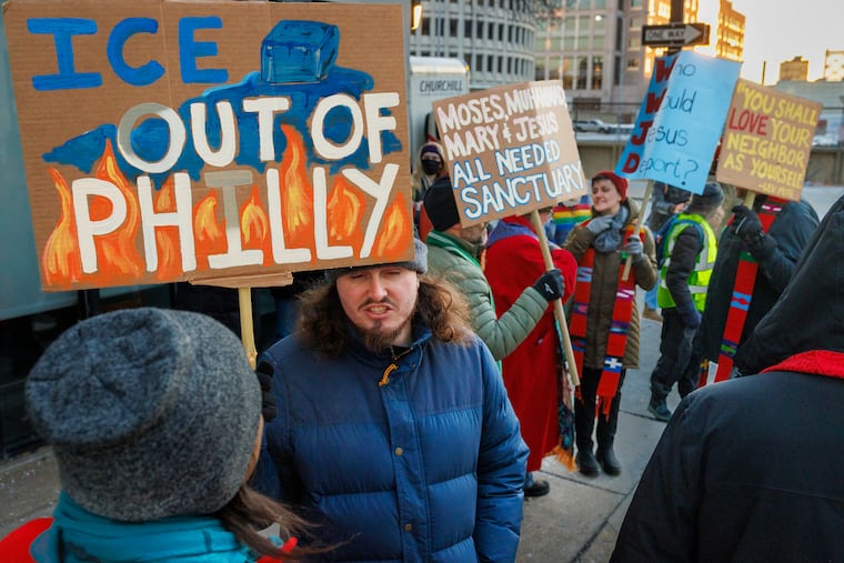 Demonstrators from No ICE Philly gathered to protest outside the U.S. Immigration and Customs Enforcement office at 8th and Cherry Streets in Philadelphia on Tuesday, Jan. 20, 2026.