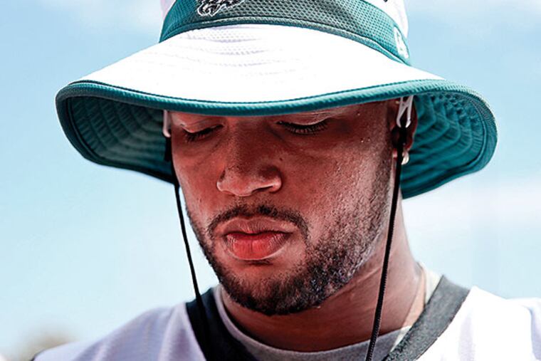 Eagles' Marcus Smith walks off the field after the Eagles Training Camp at the NovaCare Complex in Philadelphia, Pa on August 21, 2015. Smith was injured in yesterday's practice.