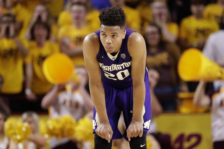 Markelle Fultz watches a foul shot during a Washington game in January.