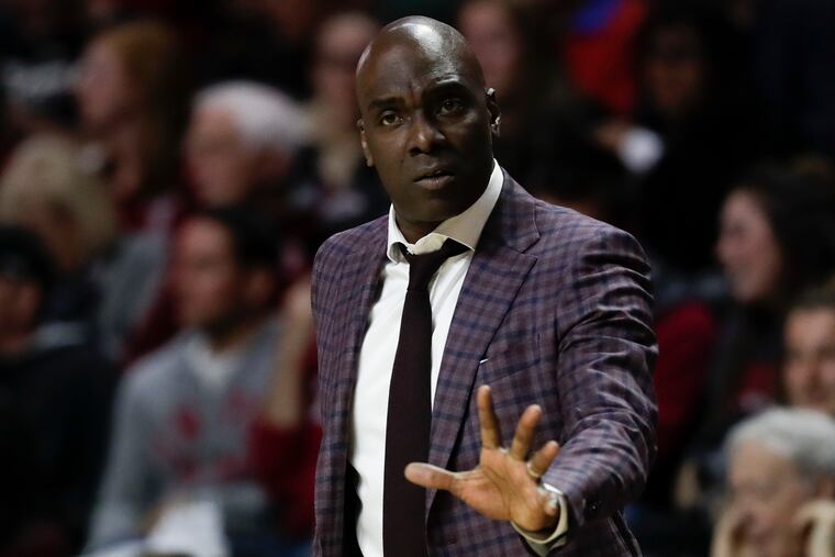 Temple coach Aaron McKie signaling to his team during the second half against Drexel.