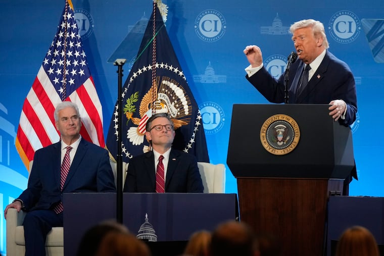 President Donald Trump speaks at the Republican Members Issues Conference, Monday, March 9, 2026, at Trump National Doral Miami in Doral, Fla., as House Majority Whip Tom Emmer, R-Minn., and House Speaker Mike Johnson of La., listen. (AP Photo/Mark Schiefelbein)