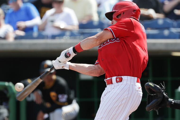 J.T. Realmuto hits a leadoff home run on the first pitch he saw from Pittsburgh Pirates starter Hector Noesi on Wednesday in Clearwater.