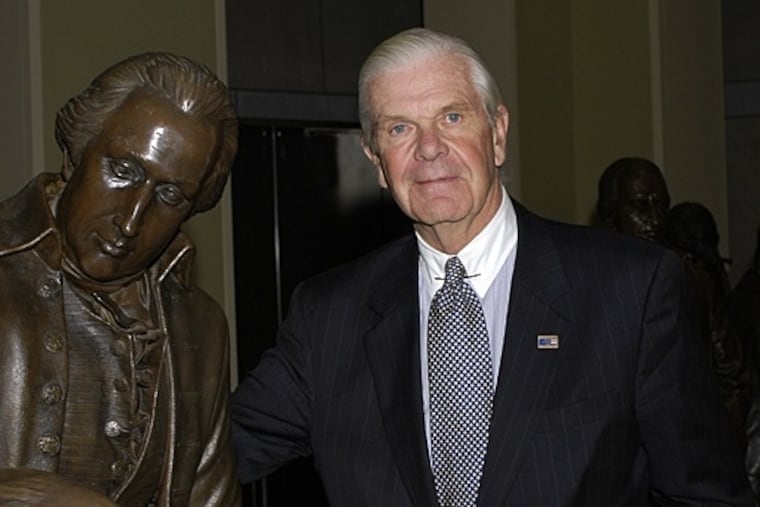 Mr. Reed poses with the founding fathers at the National Constitution Center that he helped create.