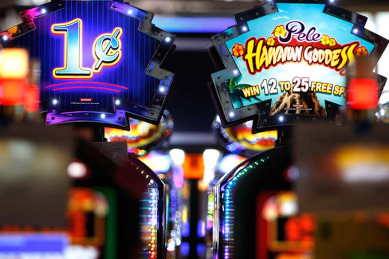 Slot machines at SugarHouse Casino, Phila.'s only casino. Six groups seek the city's second permit. (David Maialetti / Staff Photographer)