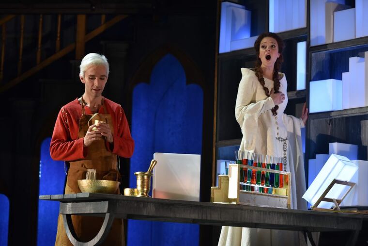 Agnès (soprano Lauren Snouffer) visits the workshop of the Boy (countertenor Anthony Roth Costanzo) to learn “how a book is made.”