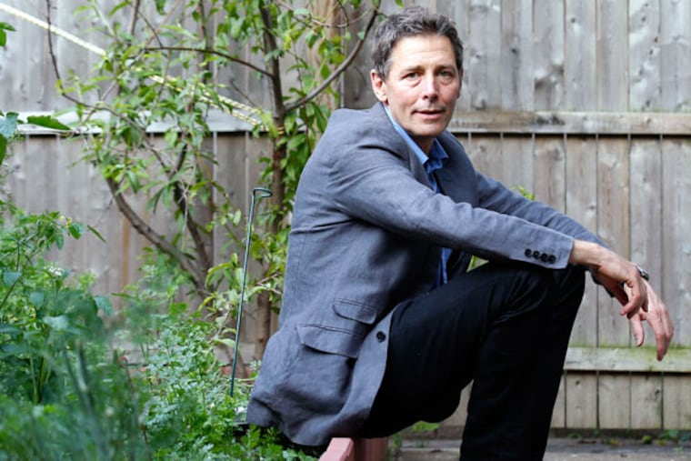Philippe Bourgois in his backyard in South Philadelphia. He was doing fieldwork for his dissertation revolution among Central America’s peasants when he got caught in a crackdown. (YONG KIM / Staff Photographer)